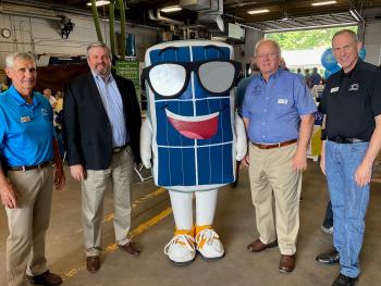 L-R: Mike Morris, vice president, Polk-Burnett board; Jeremy Browning, VP, Generation, Dairyland Power Cooperative; Solar Sam; Ed Gullickson, president, Polk-Burnett board; and Steve Stroshane, Polk-Burnett general manager.