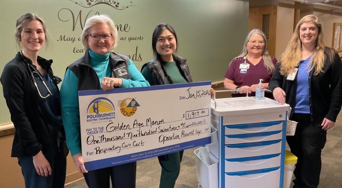 Operation Round Up grant check to Golden Age Manor, Amery