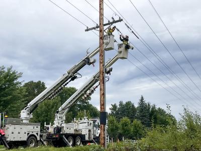 Polk-Burnett lineworkers build power lines to support Cedar Lake Substation