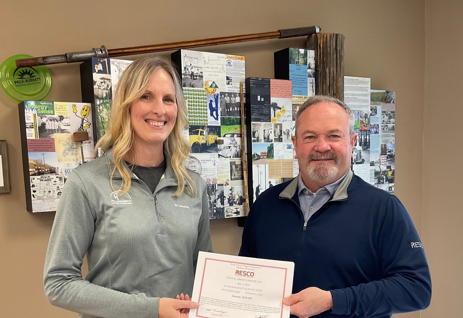 Heather Gerber accepted the patronage distribution from Dennis Gaffney, our RESCO account manager. 
